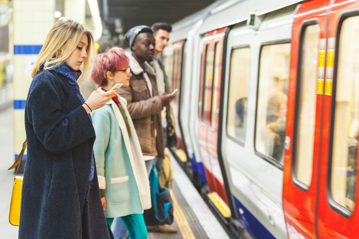 People waiting for a train on the London Underground