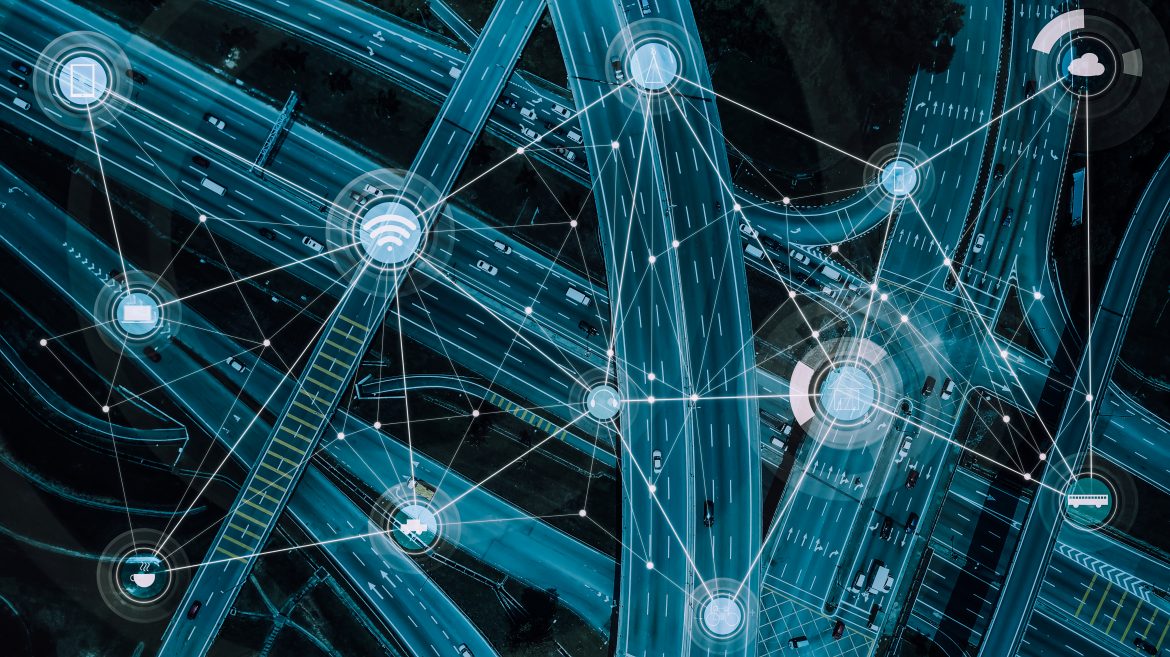 A birds-eye-view of a road network covered in digital symbols