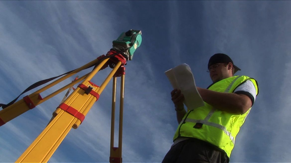 a man doing a land survey