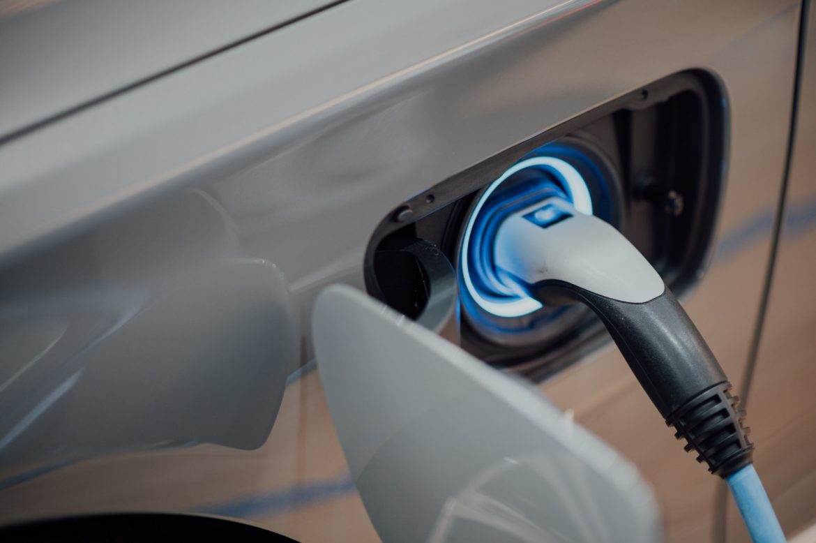 an electric vehicle being charged