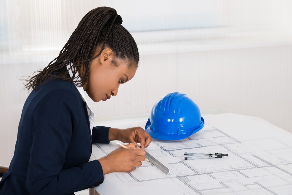 a black female doing construction planning